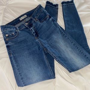 Denim Jeans with slight knee Rip